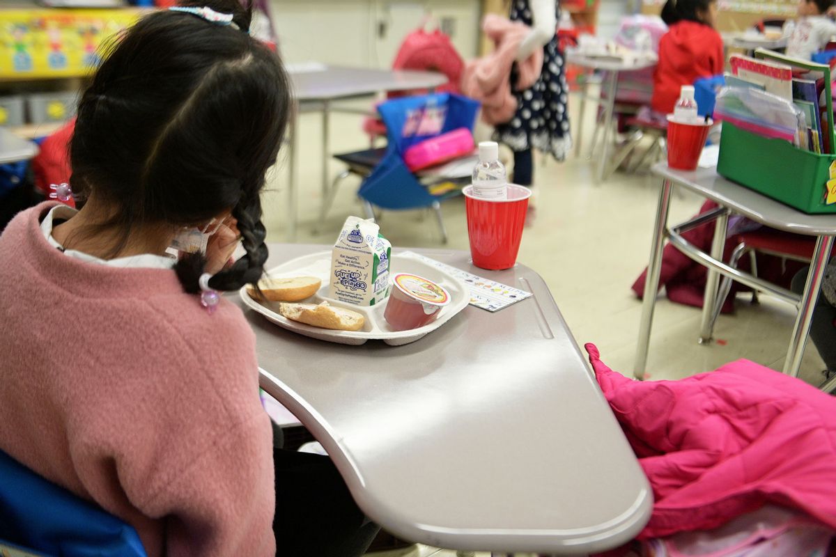 A kindergarten student eating breakfast at Yung Wing School P.S. 124 on January 13, 2021 in New York City. (Michael Loccisano/Getty Images)