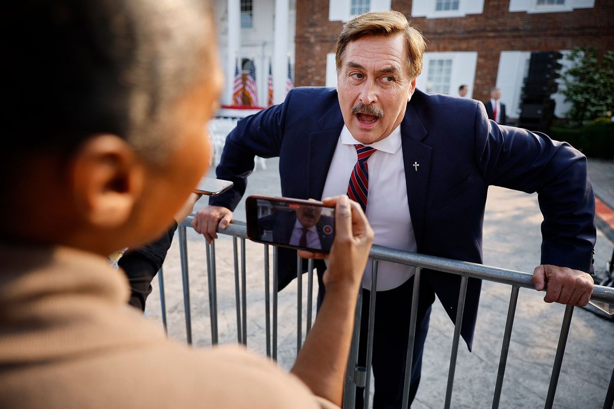 Businessman and election conspiracy theorist Mike Lindell talks with reporters outside the club house at the Trump National Golf Club hours ahead of a speech by former U.S. President Donald Trump on June 13, 2023 in Bedminster, New Jersey. (Chip Somodevilla/Getty Images)