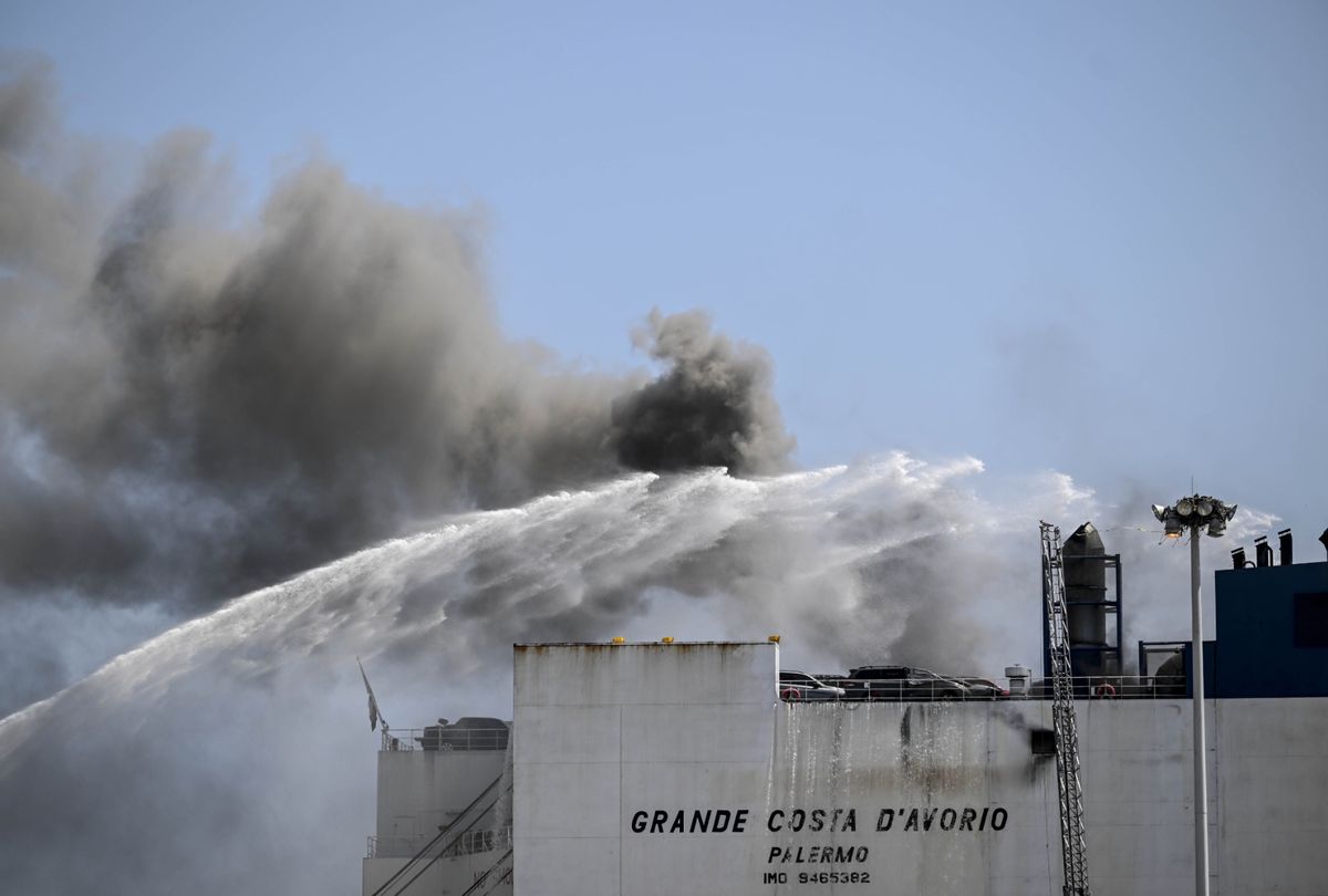 Firefighters respond a fire on a ship docked at Port Newark, New Jersey, United States on July 6, 2023. Two Newark firefighters died and five were injured late Wednesday as they battled a blaze on a massive cargo ship carrying vehicles in the port of Newark, New Jersey, officials said.  (Fatih Aktas/Anadolu Agency via Getty Images)