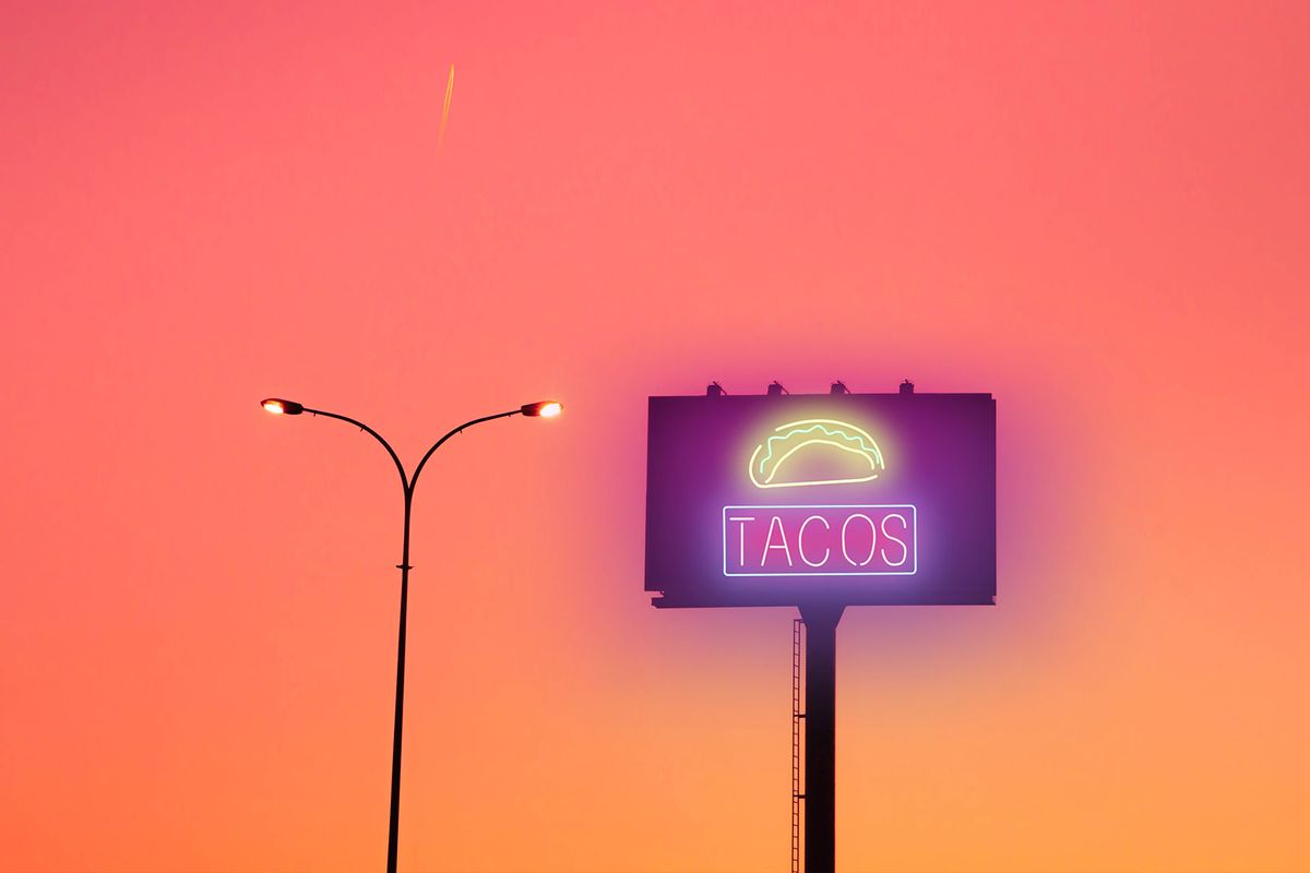 Neon billboard for Tacos (Getty Images/Artur Debat)