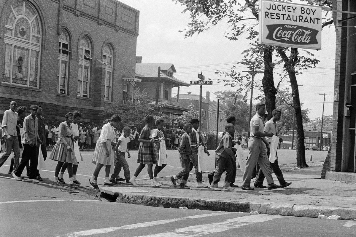 Schoolchildren and students demonstrated in the streets of Birmingham, Alabama, on May, 02, 1963, during a civil disobedience campaign to protest against racial segregation. (AFP via Getty Images)