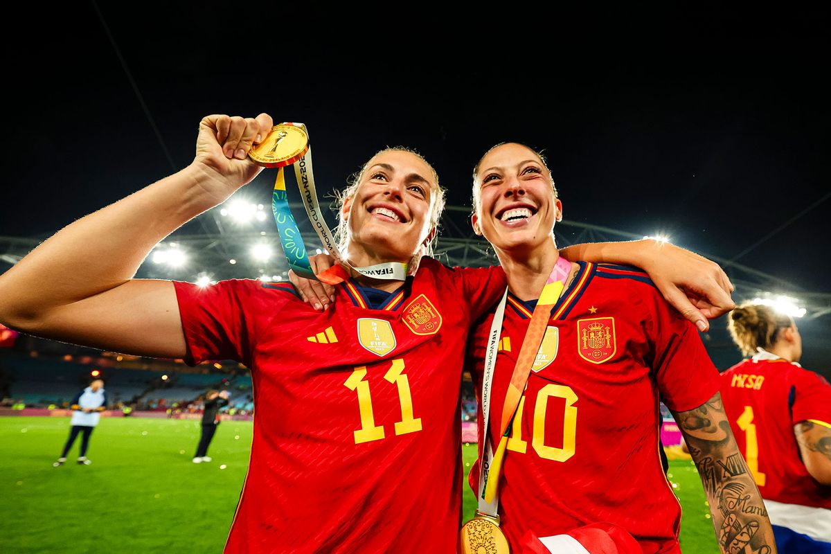 Alexia Putellas of Spain (L) celebrates the World Cup with her teammate Jennifer Hermoso of Spain (R) during the FIFA Women's World Cup Australia & New Zealand 2023 Final match between Spain and England at Stadium Australia on August 20, 2023 in Sydney, Australia. (Richard Callis/Eurasia Sport Images/Getty Images)