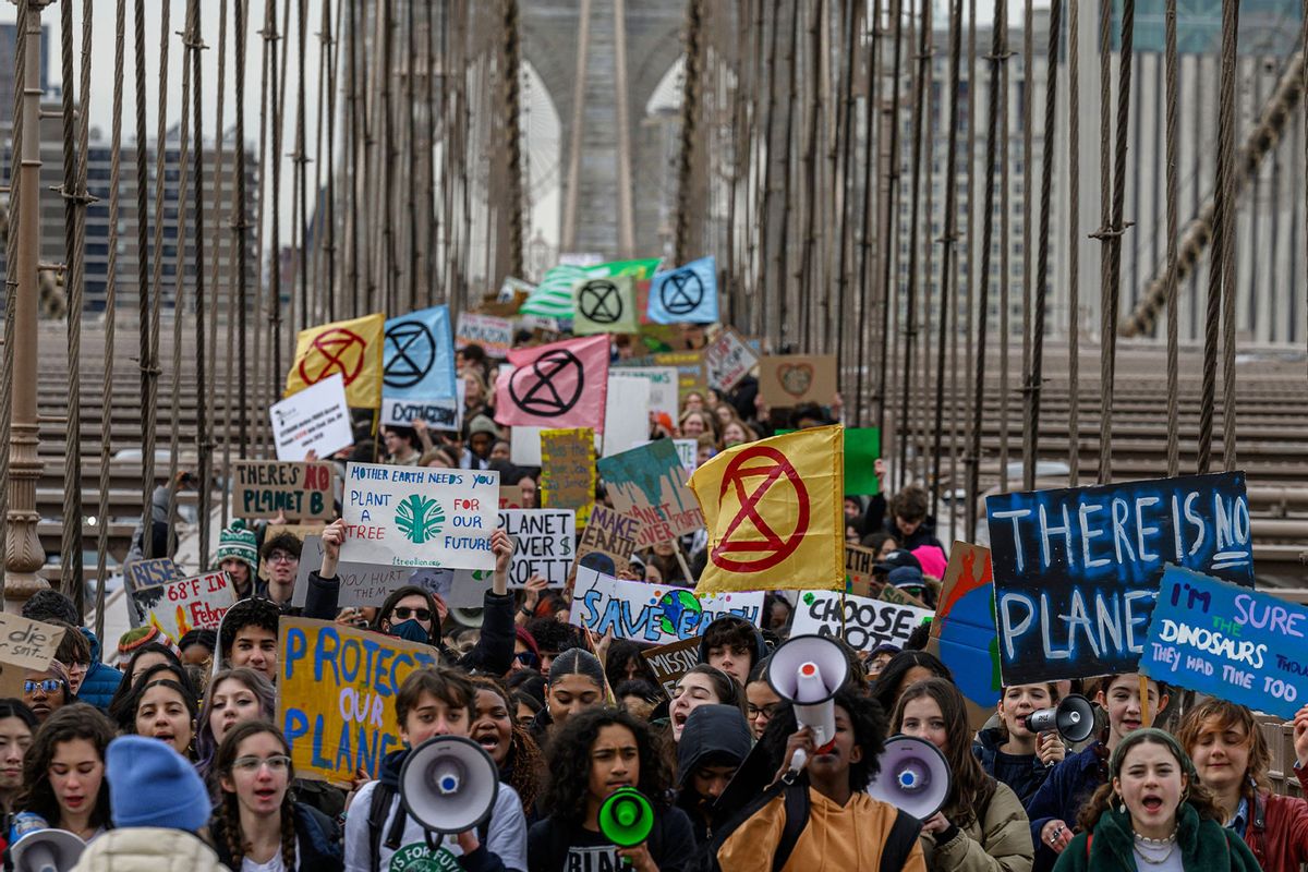 Activists from climate group Fridays for Future shout slogans and march during a Global Climate Strike in New York on March 3, 2023. (ED JONES/AFP via Getty Images)