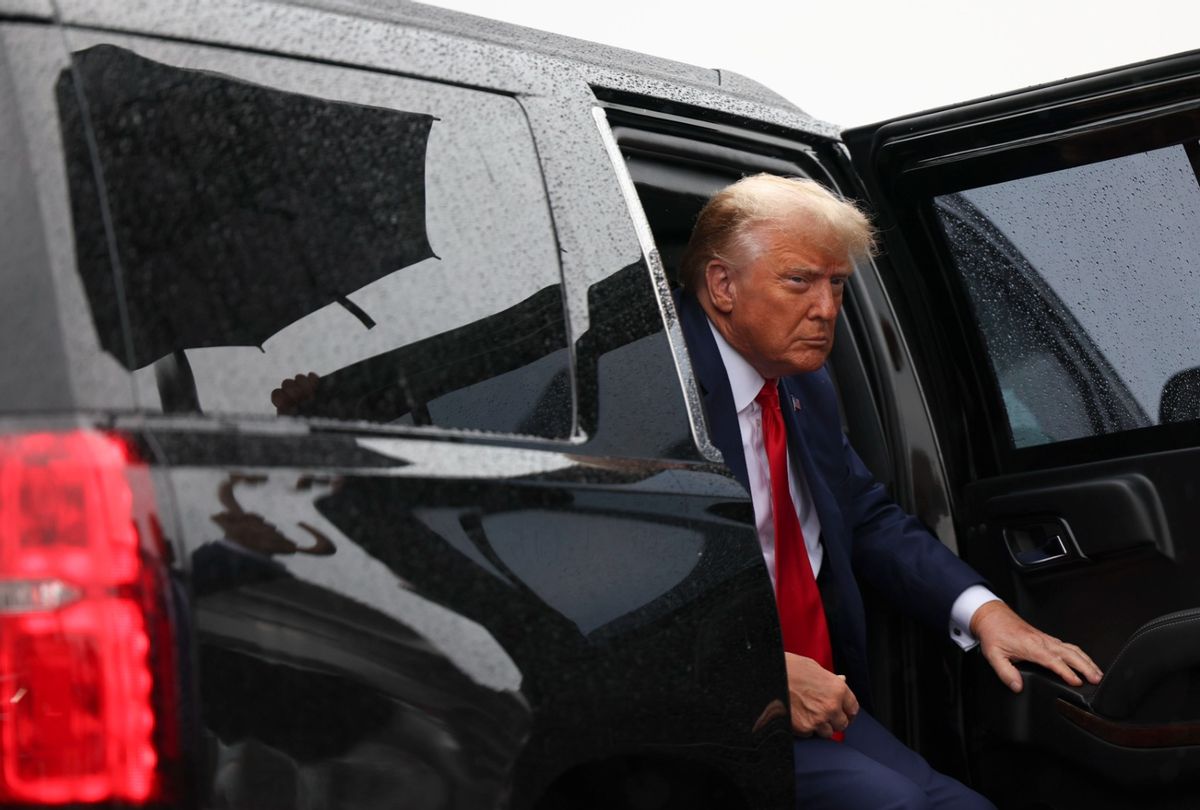 Former president Donald Trump arrives at Ronald Reagan Washington National Airport in Arlington, Va. on Thursday, August 3, 2023 after appearing at E. Barrett Prettyman United States Court House. (Tom Brenner for The Washington Post via Getty Images)