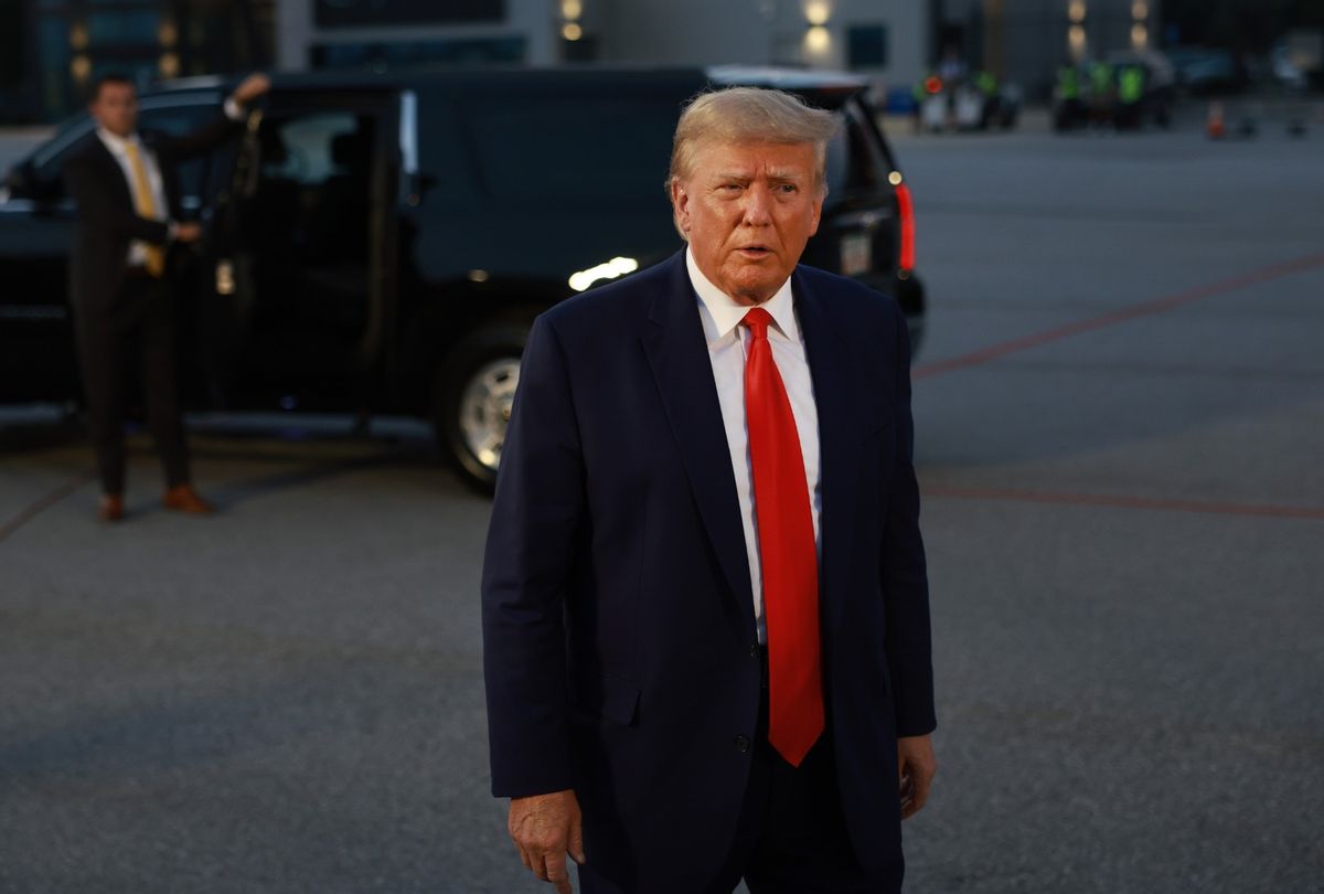 Former U.S. President Donald Trump speaks to the media at Atlanta Hartsfield-Jackson International Airport after being booked at the Fulton County jail on August 24, 2023 in Atlanta, Georgia. (Joe Raedle/Getty Images)