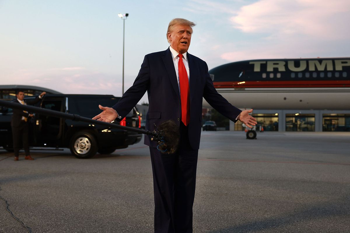 Former U.S. President Donald Trump speaks to the media at Atlanta Hartsfield-Jackson International Airport after being booked at the Fulton County jail on August 24, 2023 in Atlanta, Georgia. (Joe Raedle/Getty Images)