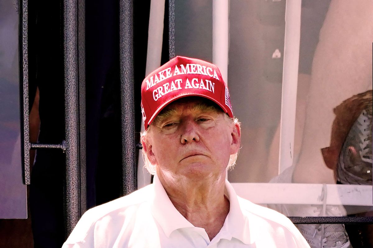 Former US President Donald Trump looks on during Round 3 at the LIV Golf-Bedminster 2023 at the Trump National in Bedminster, New Jersey on August 13, 2023. (TIMOTHY A. CLARY/AFP via Getty Images)