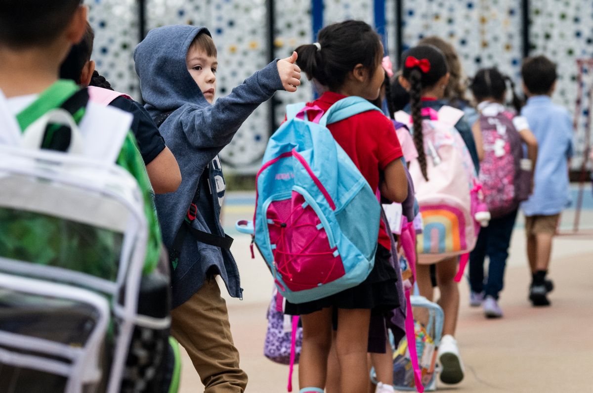 Kindergarten students head to the first day of class at Roosevelt Elementary School in Anaheim, California, Aug. 10, 2023. (Paul Bersebach/MediaNews Group/Orange County Register via Getty Images)