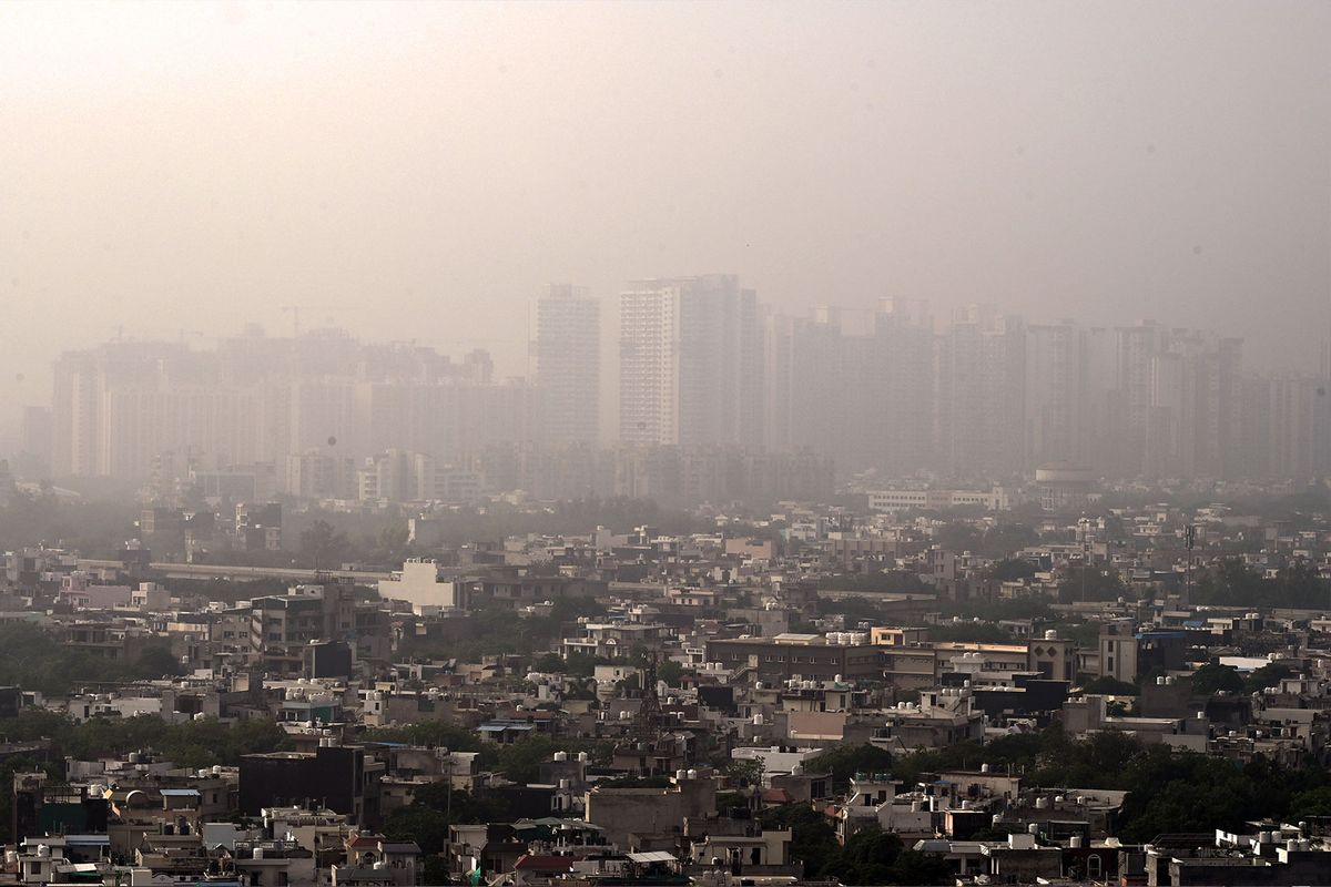 A view of city in dense smog amid rising air pollution levels, on June 18, 2023 in Noida, India. (Sunil Ghosh/Hindustan Times via Getty Images)