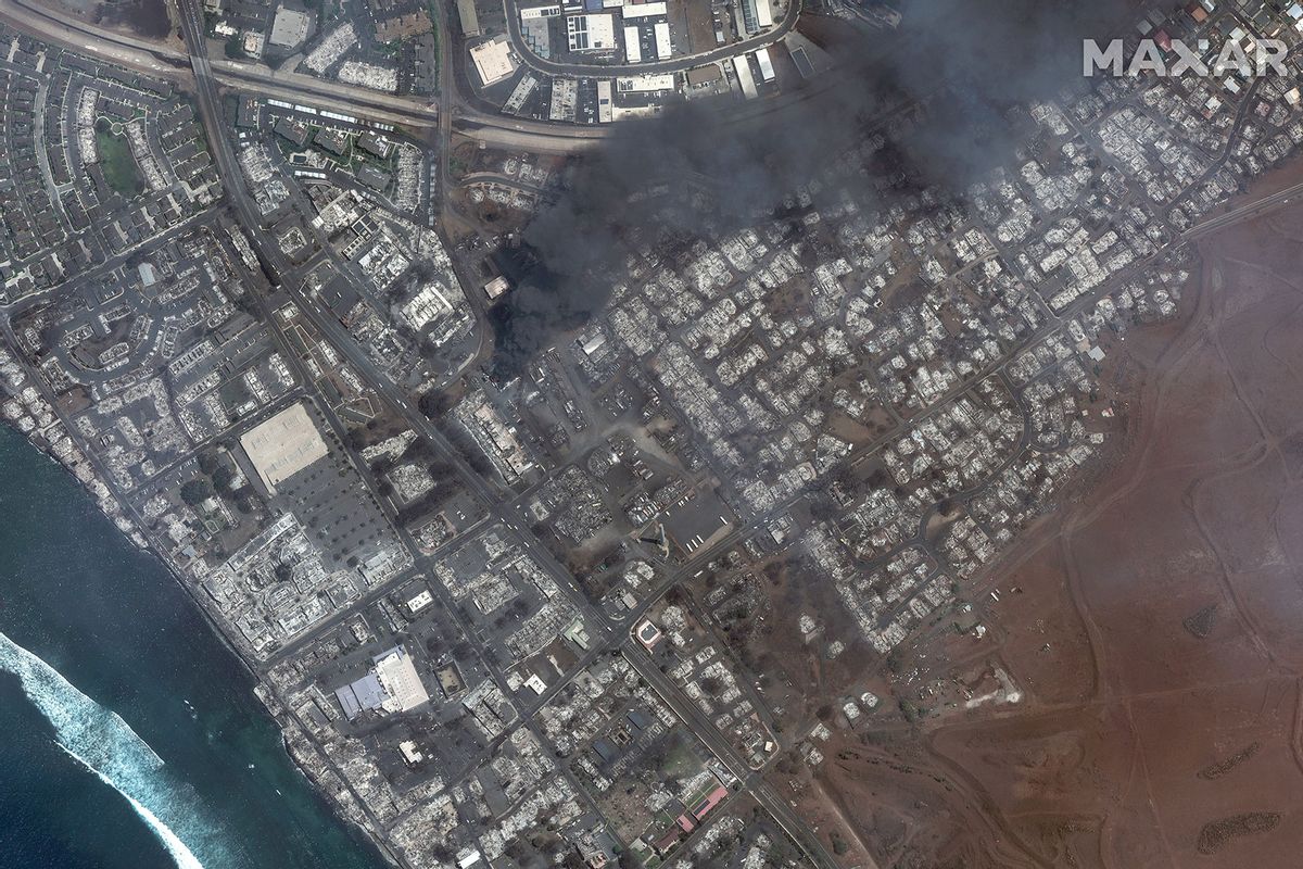 Maxar satellite imagery showing total destruction of the Lahaina square and outlets after the Lahaina Wildfire, with one building still actively burning. (Satellite image (c) 2023 Maxar Technologies / Getty Images)