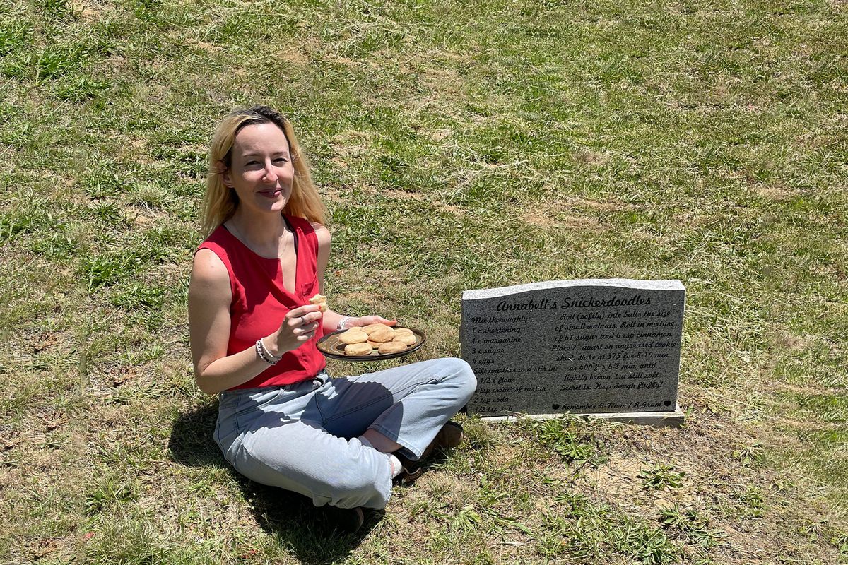 Rosie Grant sitting by the gravestone of Annabell Gunderson (Photo courtesy of Rosie Grant)