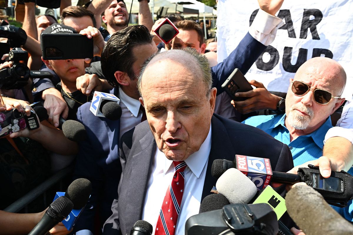 Former New York City Mayor and attorney of former US President Donald Trump, Rudy Giuliani, speaks to members of the media after being booked, outside the Fulton County Jail in Atlanta, Georgia, on August 23, 2023. (CHANDAN KHANNA/AFP via Getty Images)