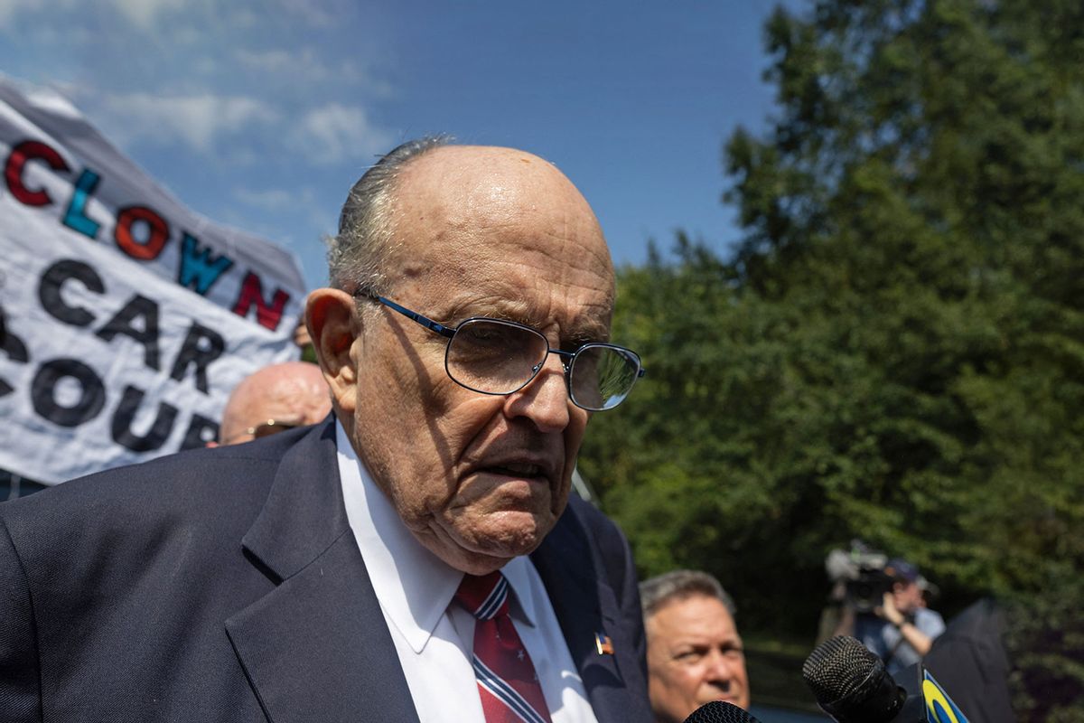 Former New York City Mayor and attorney of former US President Donald Trump, Rudy Giuliani, speaks to members of the media after being booked, outside the Fulton County Jail in Atlanta, Georgia, on August 23, 2023. (CHRISTIAN MONTERROSA/AFP via Getty Images)
