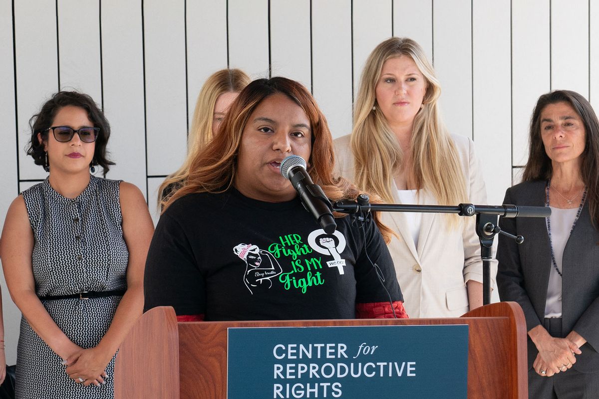 Samantha Casiano (C) speaks during a press conference outside the Travis County Courthouse on July 19, 2023 in Austin, Texas. A Texas state court will hear arguments from both sides in Zurawski v. State of Texas, a lawsuit filed by the Center for Reproductive Rights on behalf of thirteen Texas women denied abortions despite serious pregnancy complications. (SUZANNE CORDEIRO/AFP via Getty Images)