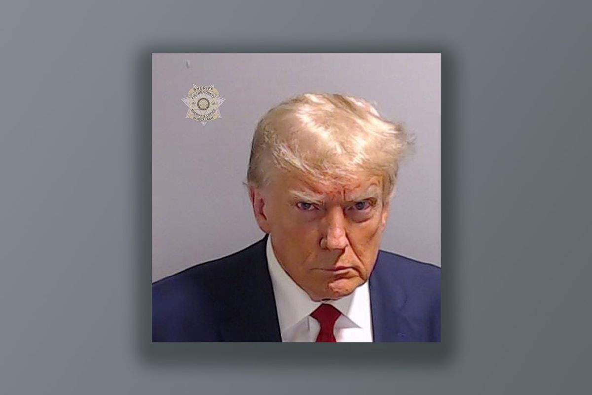 Former U.S. President Donald Trump poses for his booking photo at the Fulton County Jail on August 24, 2023 in Atlanta, Georgia, United States. Trump was booked on 13 charges related to an alleged plan to overturn the results of the 2020 presidential election in Georgia. (Photo by Fulton County Sheriff's Office / Handout/Anadolu Agency via Getty Images)