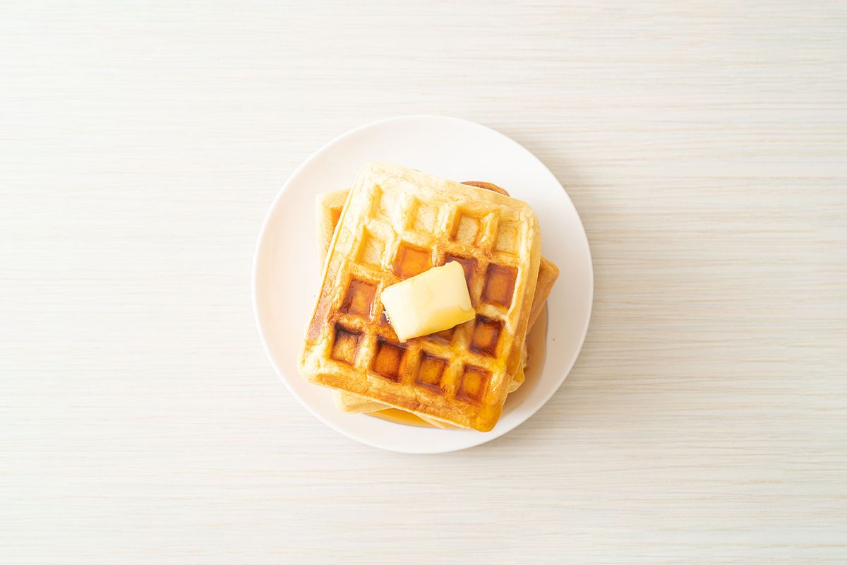 Waffle stack with butter and honey (Getty Images / Ania Todica / 500px)