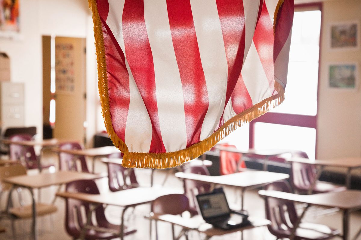 American Flag Hanging in Classroom (Getty Images/Glasshouse Images)