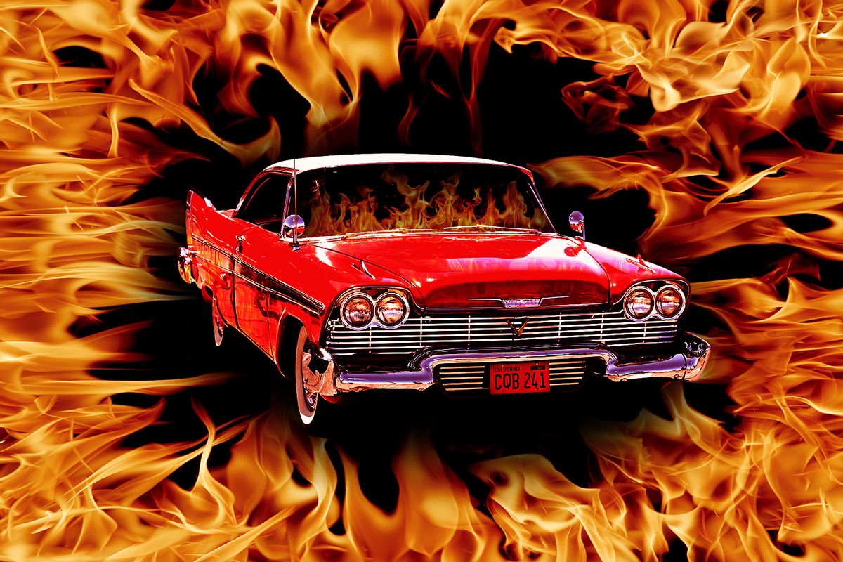 A 1958 Plymouth Fury from the movie "Christine" surrounded by flames (Photo illustration by Salon/Getty Images)