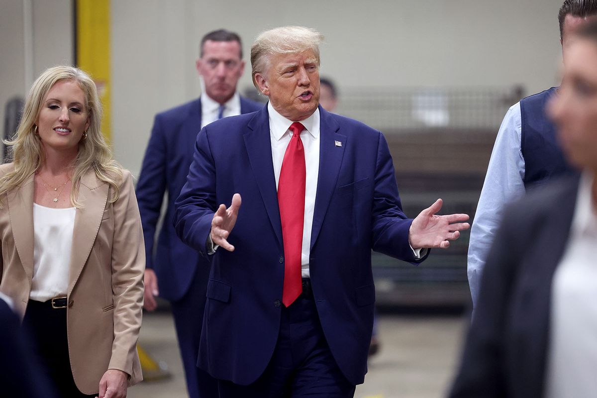 Republican presidential candidate former President Donald Trump tours Drake Enterprises, an automotive parts manufacturer, before speaking to guest at a small rally on September 27, 2023 in Clinton Township, Michigan. (Scott Olson/Getty Images)