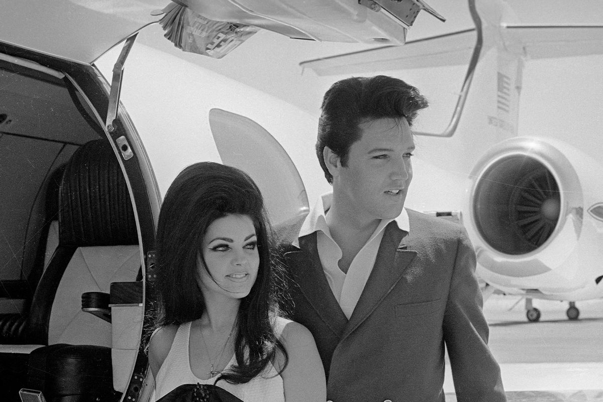 Newlyweds Elvis and Priscilla Presley, who met while Elvis was in the Army, prepare to board their private jet following their wedding at the Aladdin Resort and Casino in Las Vegas. (Getty Images)