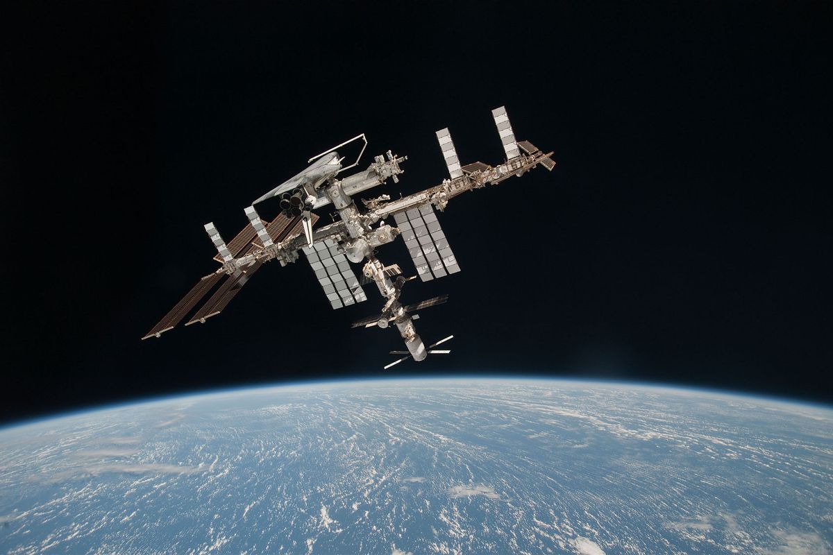 In this handout image provided by the European Space Agency (ESA) and NASA, the International Space Station and the docked space shuttle Endeavour orbit Earth during Endeavour's final sortie on May 23, 2011 in Space. (Paolo Nespoli - ESA/NASA via Getty Images)