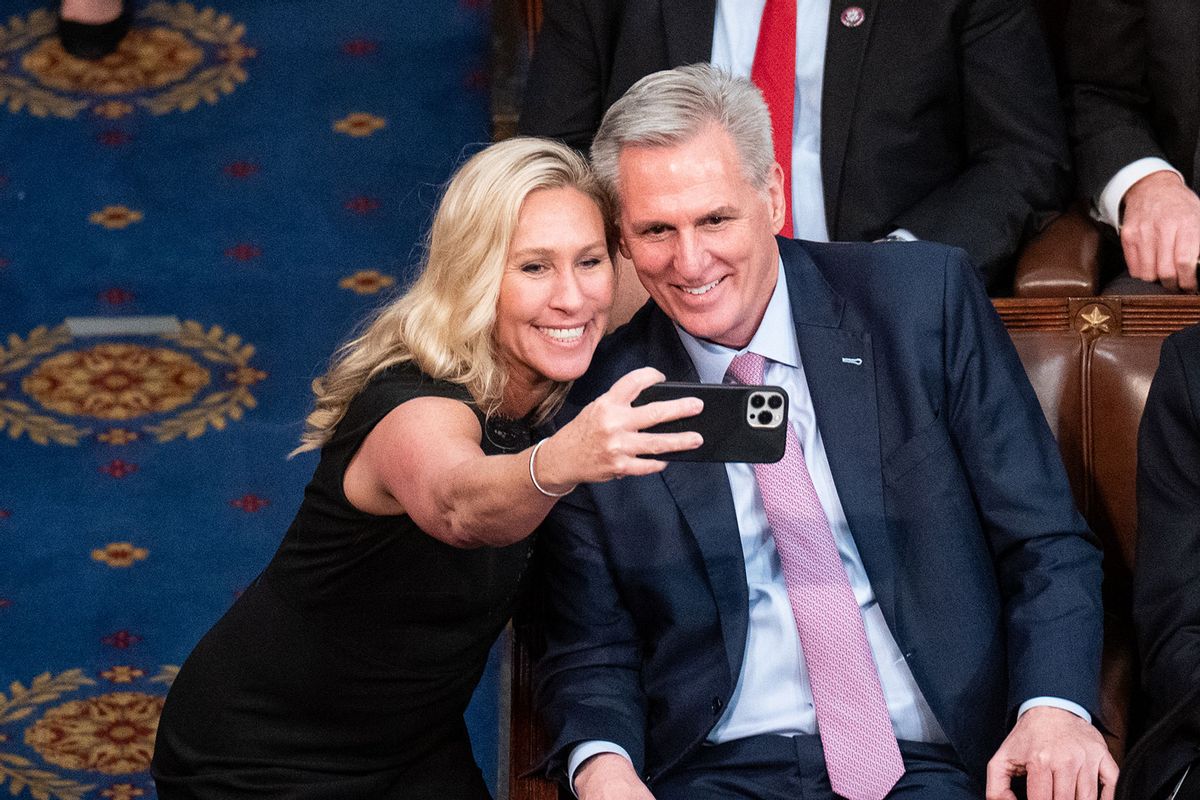 Rep. Marjorie Taylor Greene, R-Ga., takes a selife with Republican Leader Kevin McCarthy, R-Calif., at the end of the 15th vote after he received enough votes to become Speaker of the House early Saturday morning, January 7, 2023. (Bill Clark/CQ-Roll Call, Inc via Getty Images)