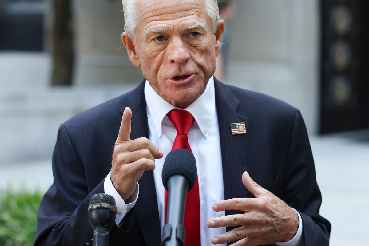 Peter Navarro, an advisor to former U.S. President Donald Trump, speaks to reporters as he arrives at the E. Barrett Prettyman Courthouse on September 07, 2023 in Washington, DC. (Photo by Kevin Dietsch/Getty Images)