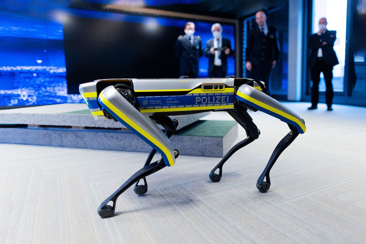 Herbert Reul (2nd from left, CDU), Minister of the Interior of North Rhine-Westphalia, controls the robot Hund Spot from Boston Dynamics at the opening of the police's new "Innovation Lab" at the Digitalkontor. (Rolf Vennenbernd/picture alliance via Getty Images)