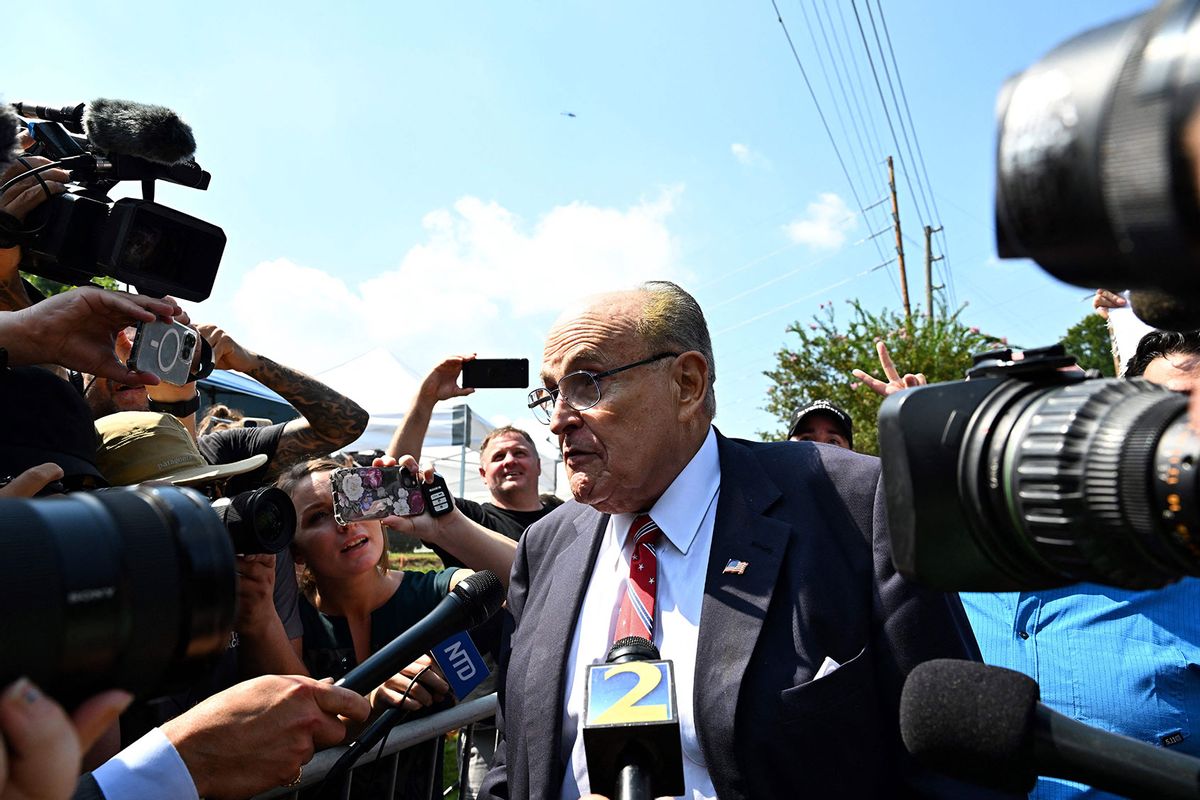 Former New York City Mayor and attorney of former US President Donald Trump, Rudy Giuliani, speaks to members of the media after being booked, outside the Fulton County Jail in Atlanta, Georgia, on August 23, 2023. (CHANDAN KHANNA/AFP via Getty Images)