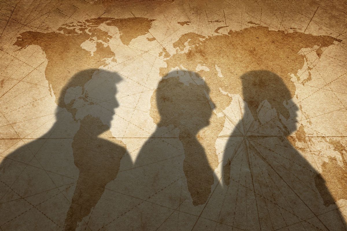 Shadows of "Little Men" against a world map (Photo illustration by Salon/Getty Images)