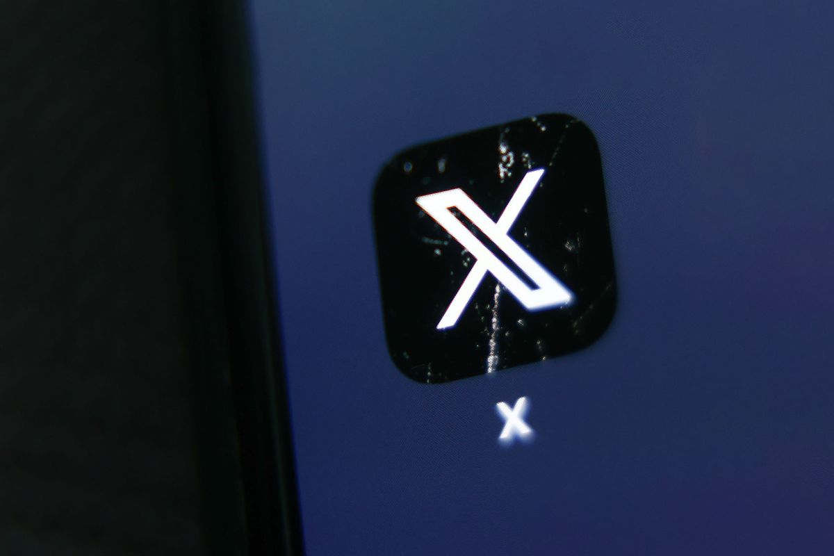 X icon is seen displayed on a phone screen (Jakub Porzycki/NurPhoto via Getty Images)