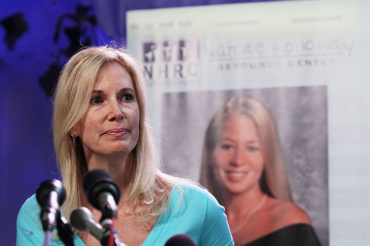 Beth Holloway fights back tears as she participates in the launch of the Natalee Holloway Resource Center on June 8, 2010 in Washington, DC. The non profit resource center was founded by Holloway and the National Museum of Crime & Punishment and was created to assist families of missing persons. Beth Holloway's daughter Natalee is the Alabama teen who disappeared five years ago in Aruba. (Mark Wilson/Getty Images)