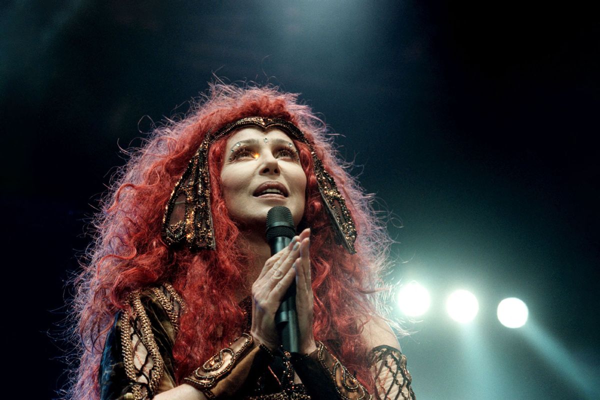 American pop star Cher performs 17 November 1999 in Stockholm's Globe Arena. (TOBIAS ROSTLUND/SCANPIX SWEDEN/AFP via Getty Images)