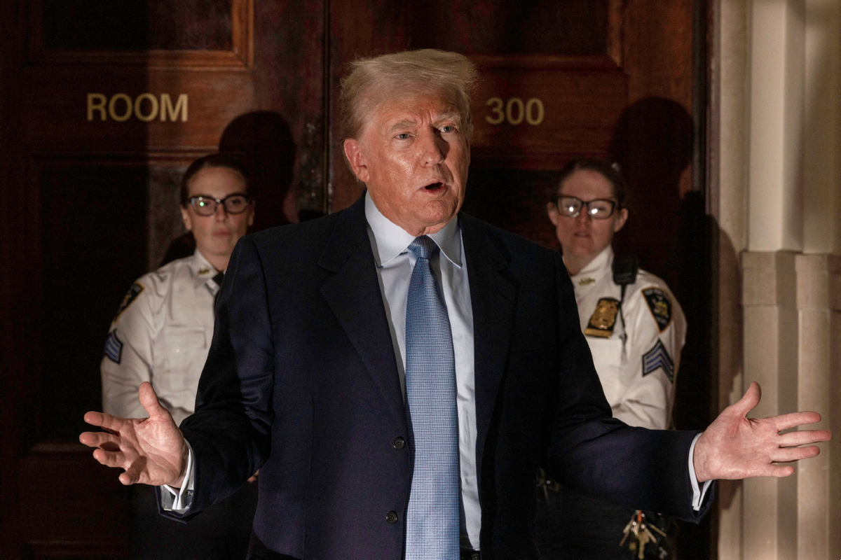 Donald Trump addresses the media before leaving the courthouse for the day at the New York State Supreme Court in New York on October 18, 2023. ( ALEX KENT/AFP via Getty Images)