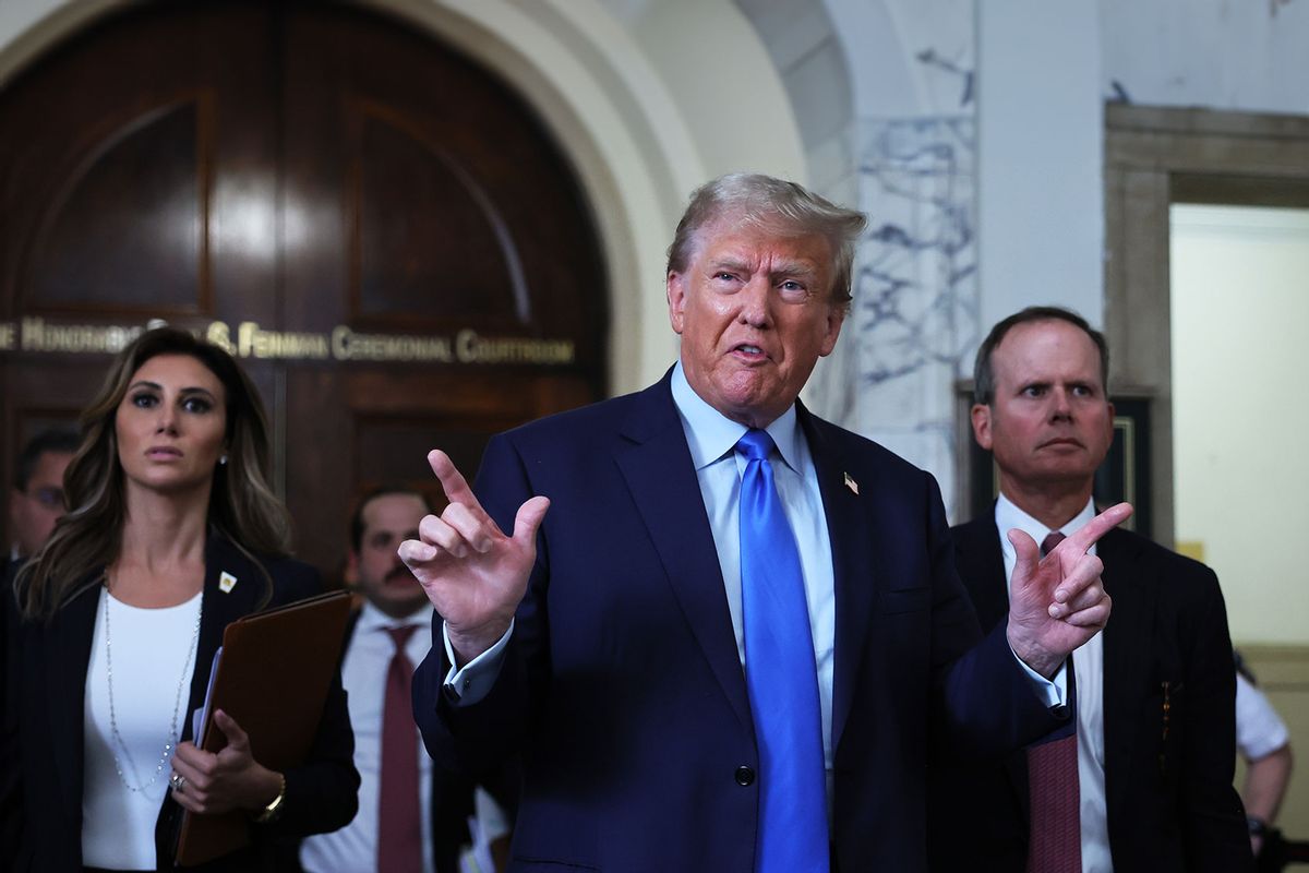 Former U.S. President Donald Trump speaks to the media after exiting the courtroom for a lunch recess during the first day of his civil fraud trial at New York State Supreme Court on October 02, 2023 in New York City. (Michael M. Santiago/Getty Images)