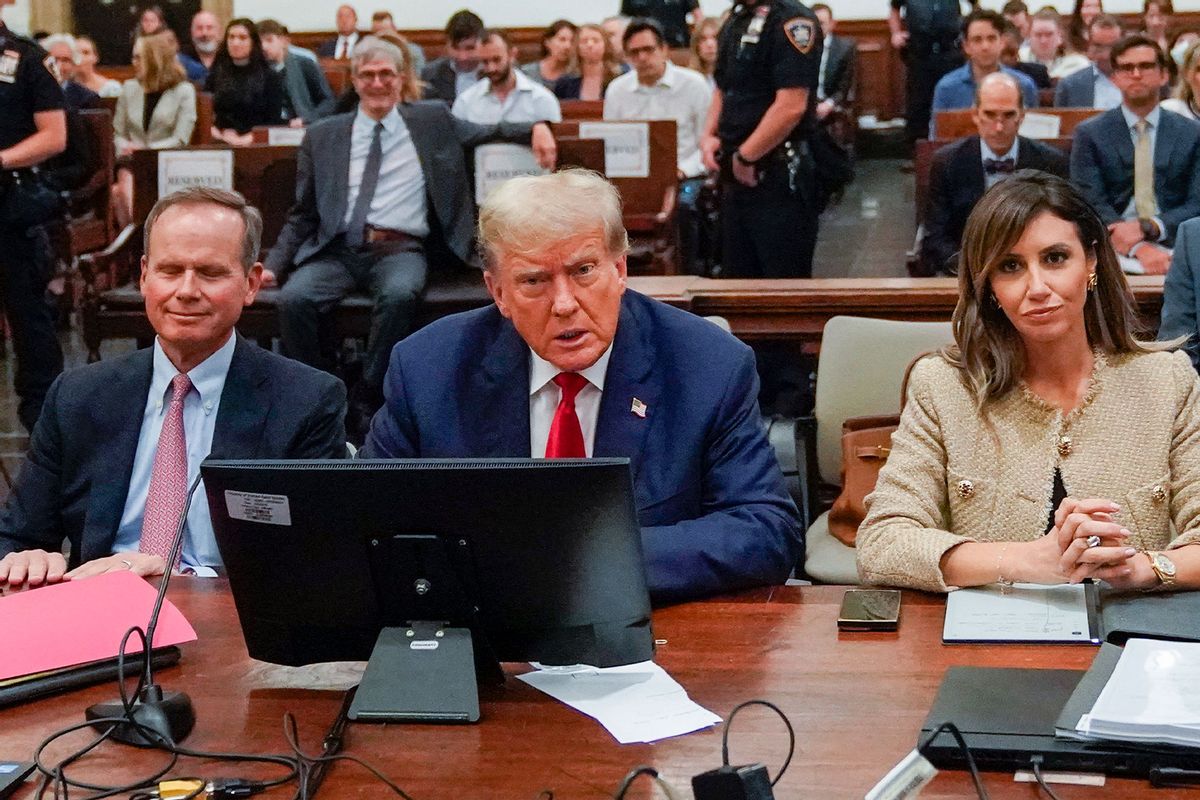 Former U.S. President Donald Trump appears in the courtroom with his attorneys Christopher M. Kise and Alina Habba for the third day of his civil fraud trial at New York State Supreme Court on October 04, 2023 in New York City.  (Mary Altafeer-Pool/Getty Images)