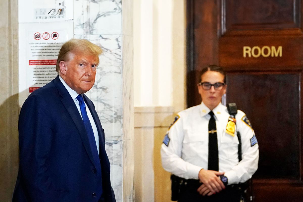 Former US President Donald Trump speaks to the press during a break in Trump's fraud trial in New York on October 25, 2023. (TIMOTHY A. CLARY/AFP via Getty Images)