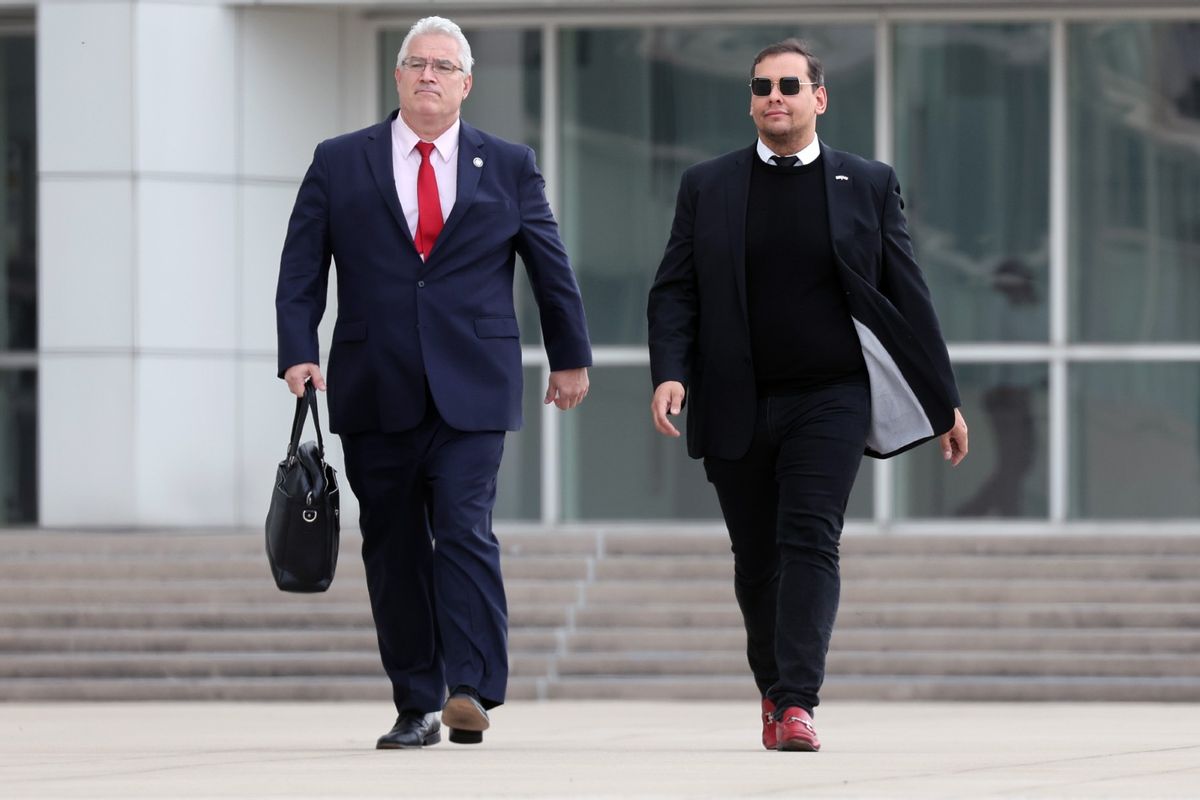 U.S. Representative George Santos (R-NY) walks out of a federal courthouse in Long Island with his lawyer Joe Murray on October 27, 2023 in Central Islip, New York. (Spencer Platt/Getty Images)