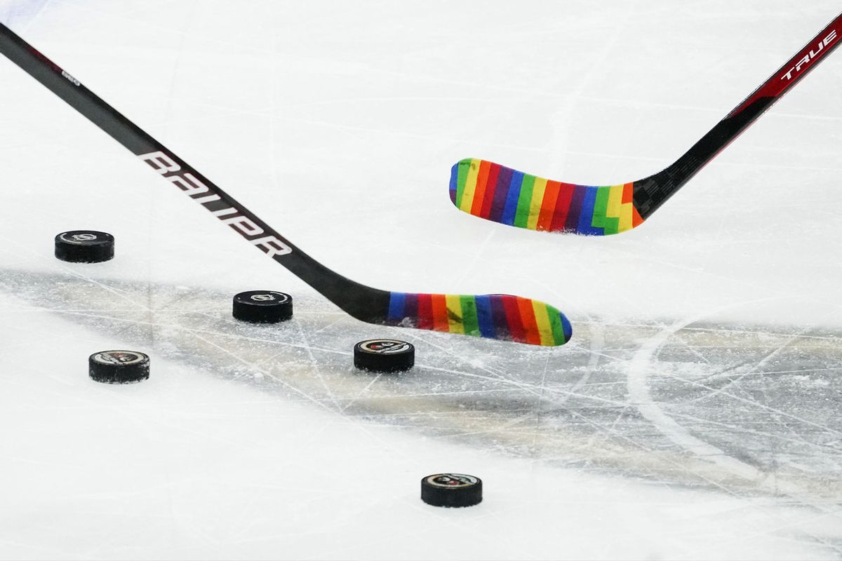Members of the Ottawa Senators warm up with rainbow tape on their sticks to celebrate "Hockey is for Everyone" prior to a game against the Vancouver Canucks at Canadian Tire Centre on April 28, 2021 in Ottawa, Ontario, Canada. (André Ringuette/NHLI via Getty Images)