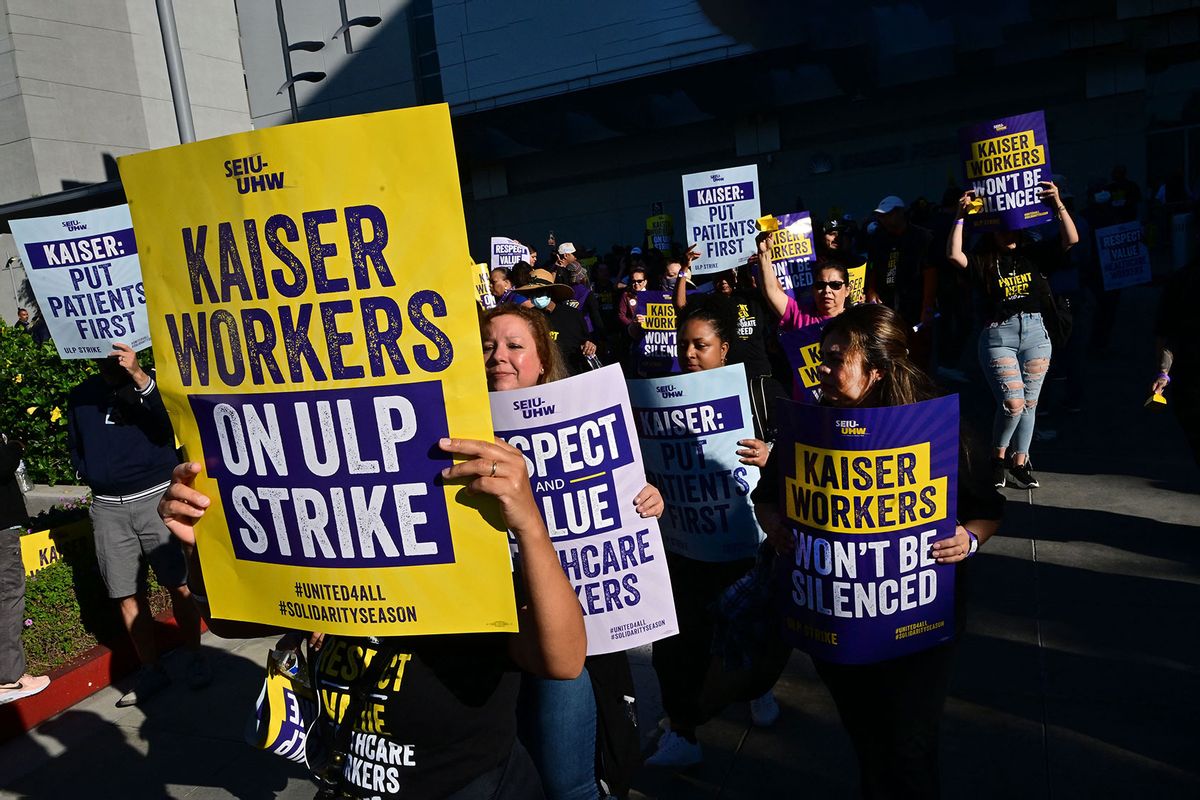 Kaiser Permanente employees, joined by Union members representing the workers, walk the picket line in Los Angeles, California on October 4, 2023. (FREDERIC J. BROWN/AFP via Getty Images)