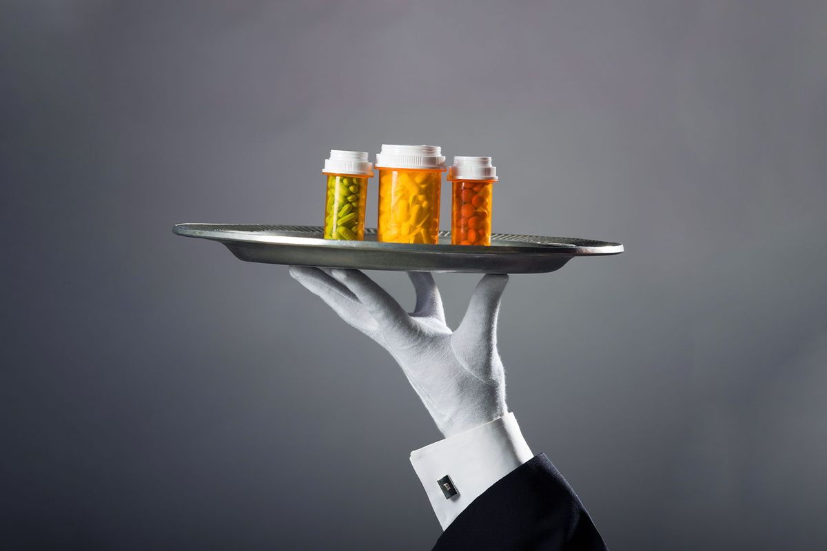 Prescription drugs on a silver platter (Getty images/Rubberball/Mike Kemp)