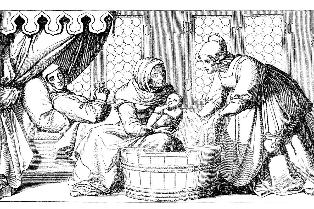 Steel engraving of Midwife bathing newborn after birth (Getty Images/Grafissimo)