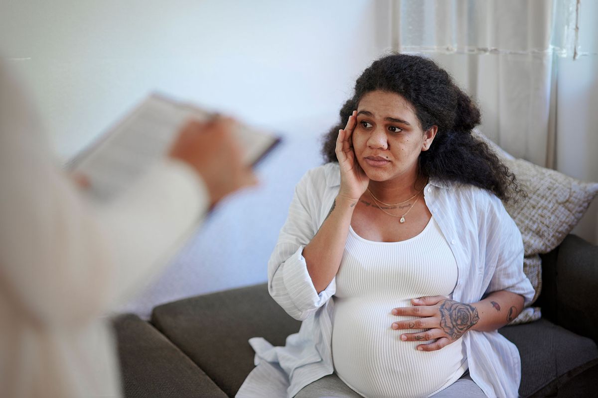 Pregnant woman at the doctor's appointment. Maternity hospital