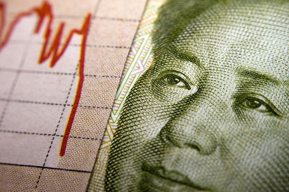 Stock Market Graph and Chinese banknote, closeup (Getty Images/claffra)