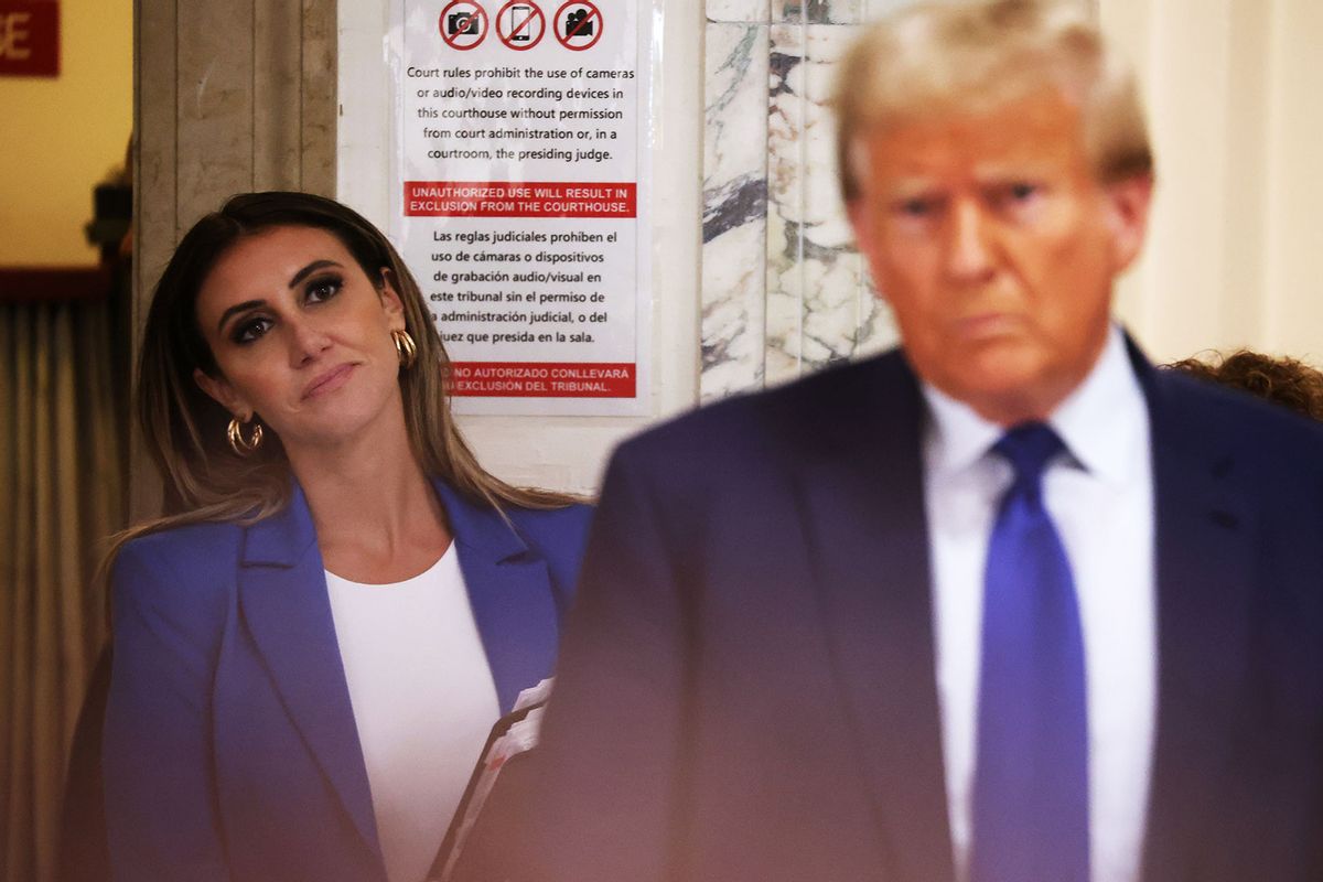 One of former President Donald Trump's lawyers, Alina Habba, watches as Trump speaks to the media at New York State Supreme Court on October 25, 2023 in New York City. (Spencer Platt/Getty Images)