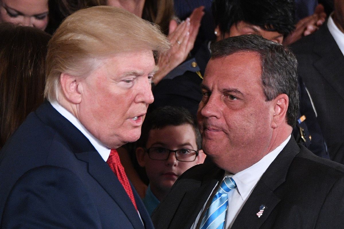 Donald Trump (L) speaks with Governor Chris Christie (R-NJ) after he delivered remarks on combatting drug demand and the opioid crisis on October 26, 2017 in the East Room of the White House in Washington, DC. ( JIM WATSON/AFP via Getty Images)