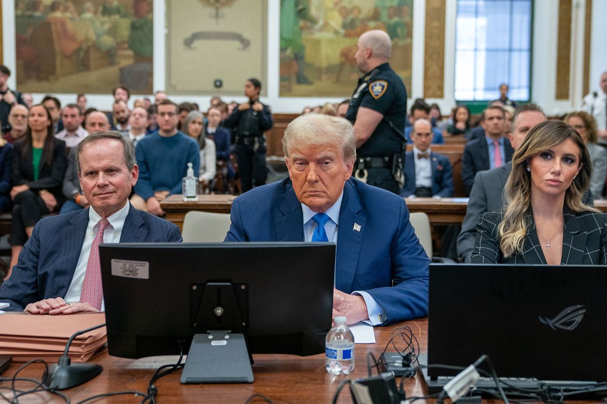 Former U.S. President Donald Trump (C) prepares to testify during his trial in New York State Supreme Court on November 06, 2023 in New York City. (David Dee Delgado/Getty Images)