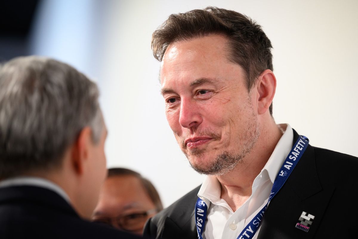 SpaceX, X (formerly known as Twitter), and Tesla CEO Elon Musk speaks with other delegates during day one of the AI Safety Summit at Bletchley Park on November 01, 2023 in Bletchley, England.  (Leon Neal/Getty Images)