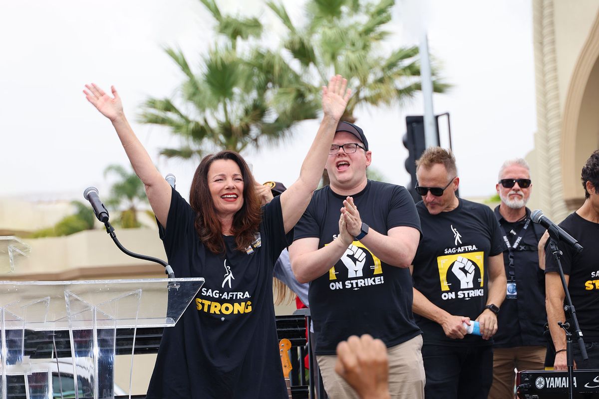 President of SAG-AFTRA Fran Drescher and Duncan Crabtree-Ireland (C) appear on stage at the SAG-AFTRA Los Angeles Solidarity March and Rally on September 13, 2023 in Los Angeles, California. (David Livingston/Getty Images)