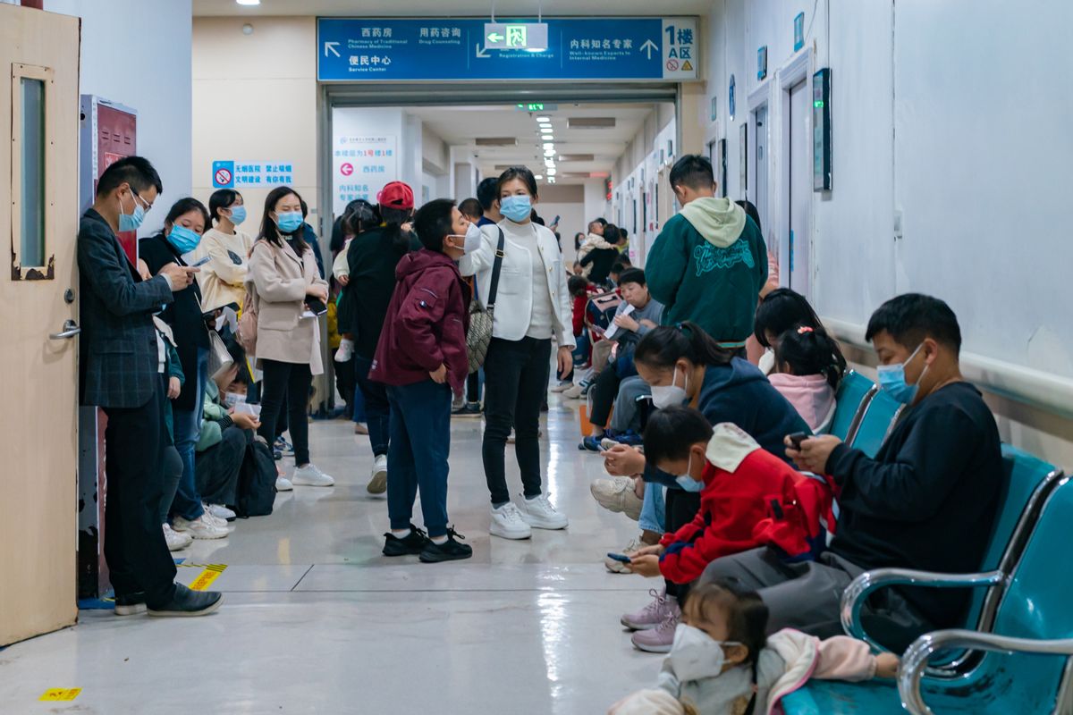 CHONGQING, CHINA - NOVEMBER 23, 2023 - Parents with children suffering from respiratory diseases line up at a children's hospital in Chongqing, China, November 23, 2023. (CFOTO/Future Publishing via Getty Images)